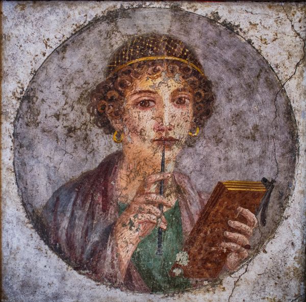 Portræt-fresko fra Pompeji, der viser en ung kvinde med stylus og vokstavle.